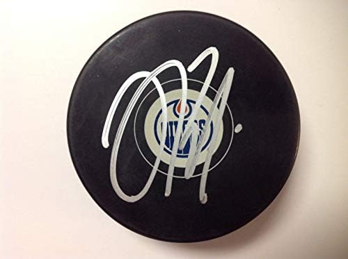 Джеси Пулджуярви Подписа хокей шайба Едмънтън Ойлърс с автограф a - за Миене на НХЛ с автограф